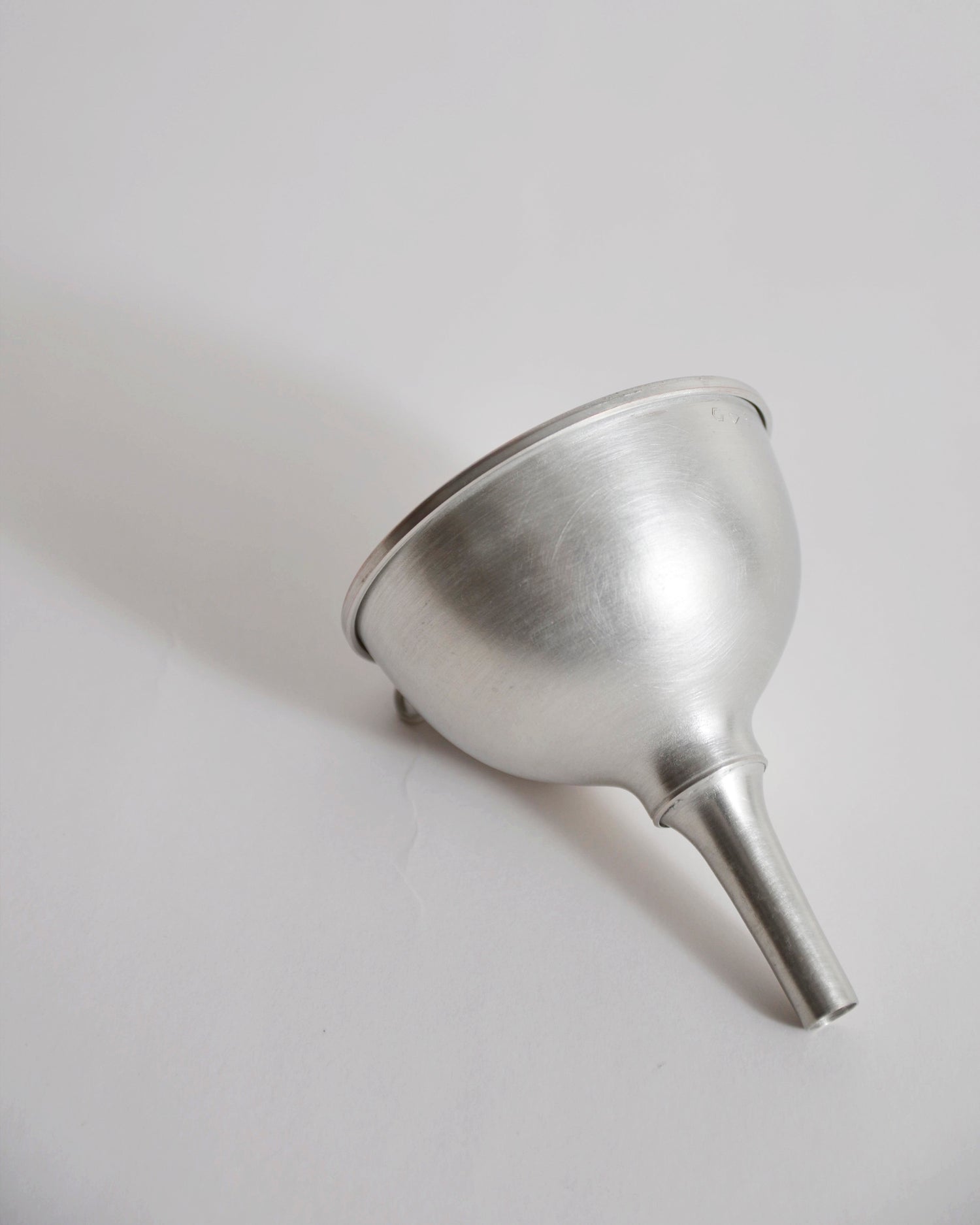 Copper funnel with tin plating by Azmaya on a gray background