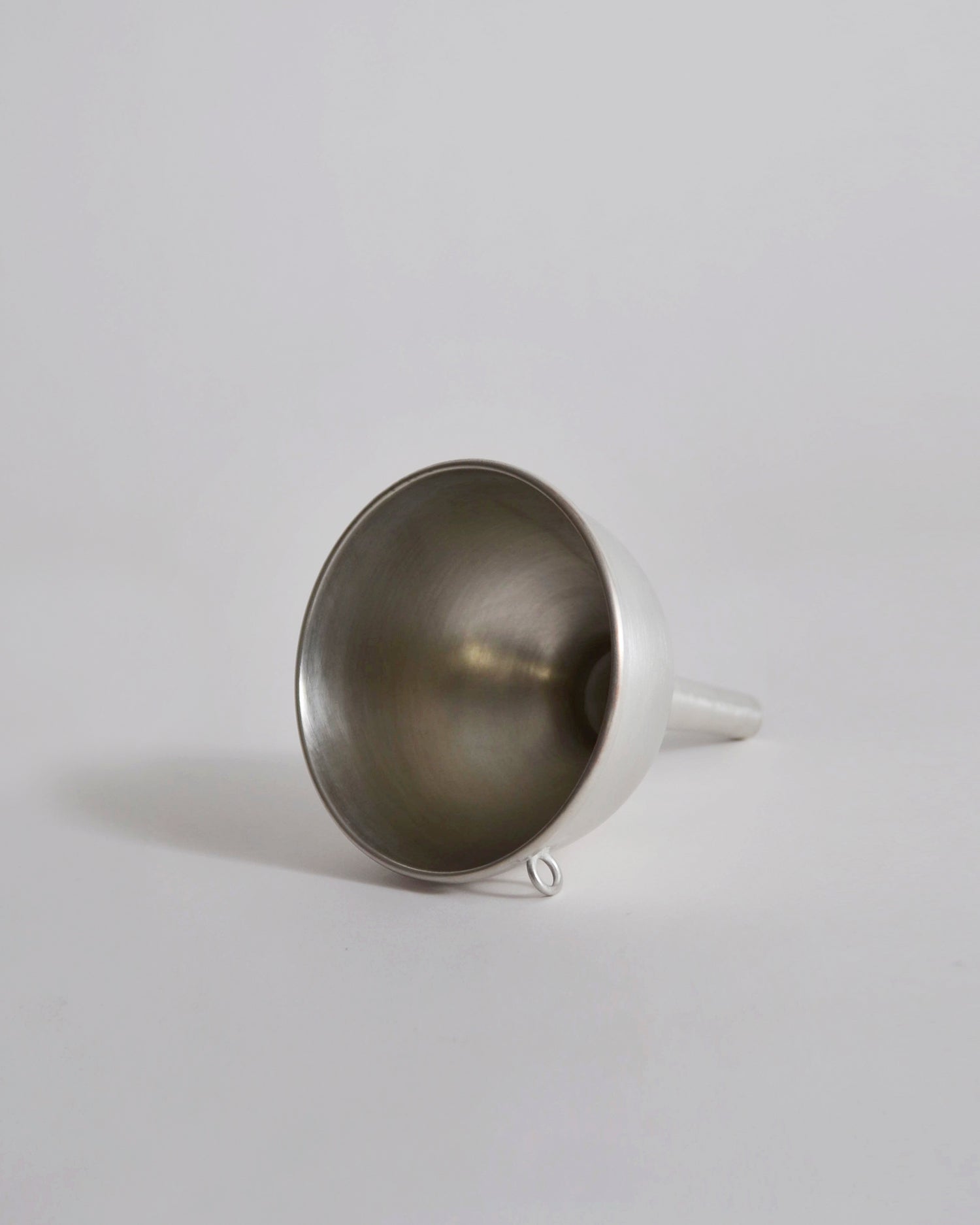 Copper funnel with tin plating by Azmaya on a gray background