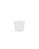 Silhouetted mini choko cut glass in crystal pattern against white background.