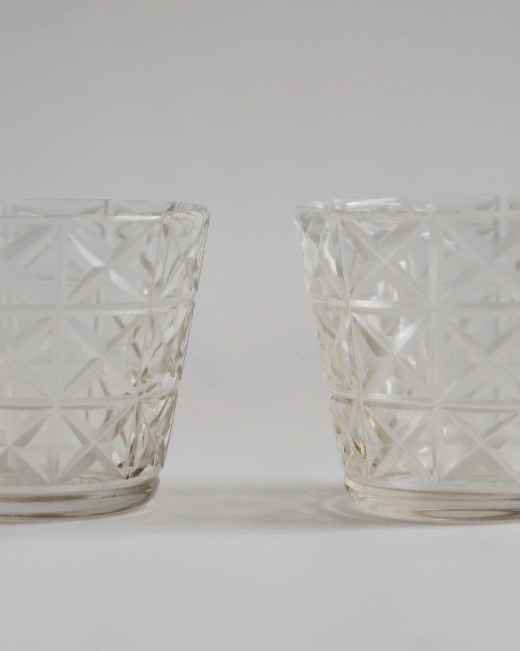 Cropped detailed photo featuring two mini choko crystal cut glass side by side.