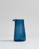 Wire net one lipped pitcher in dark blue.
