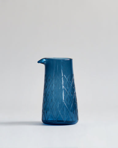 Wire net one lipped pitcher in dark blue.