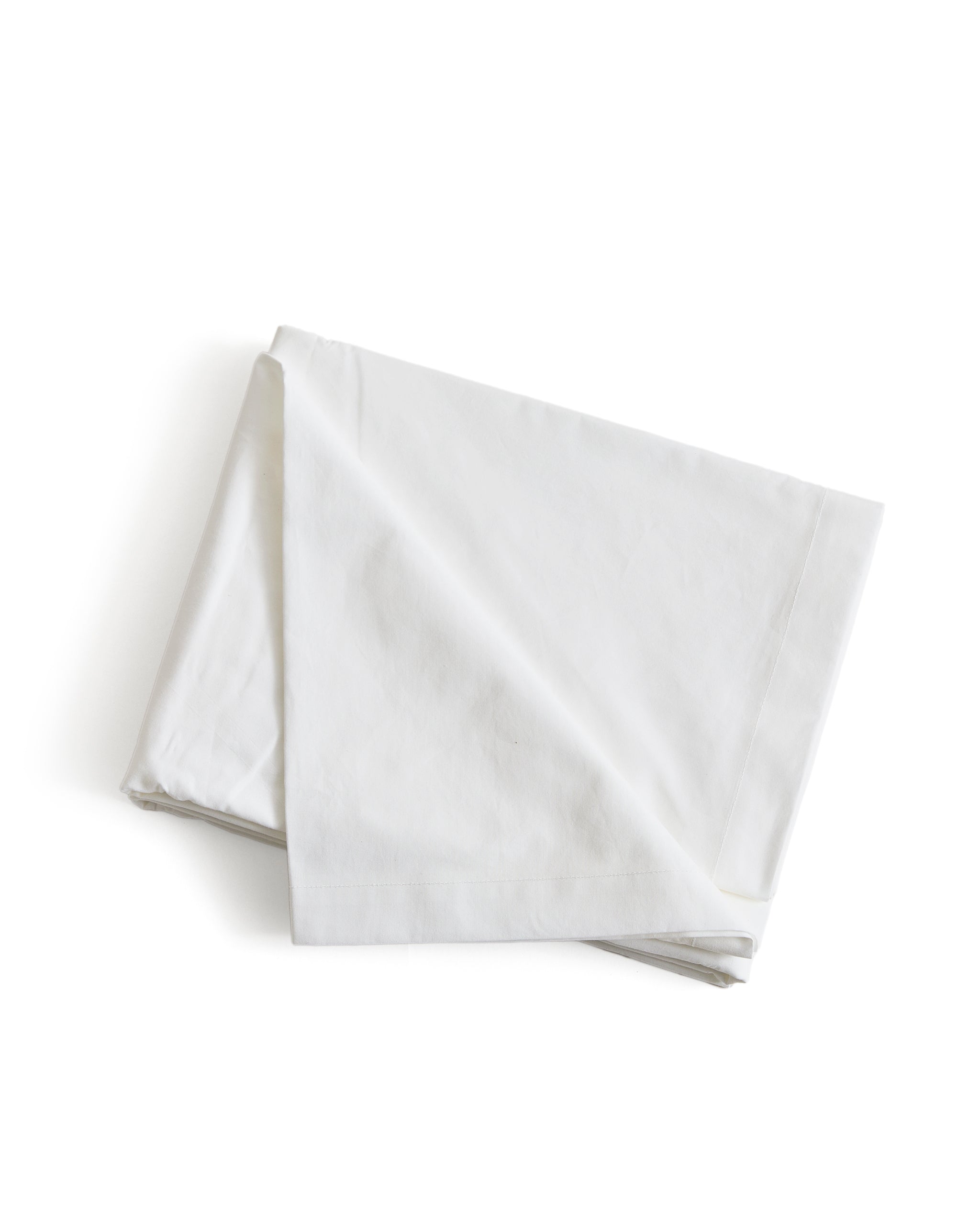 White folded flat sheet by Iwata on a white background