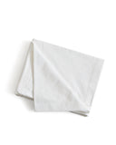 White folded flat sheet by Iwata on a white background
