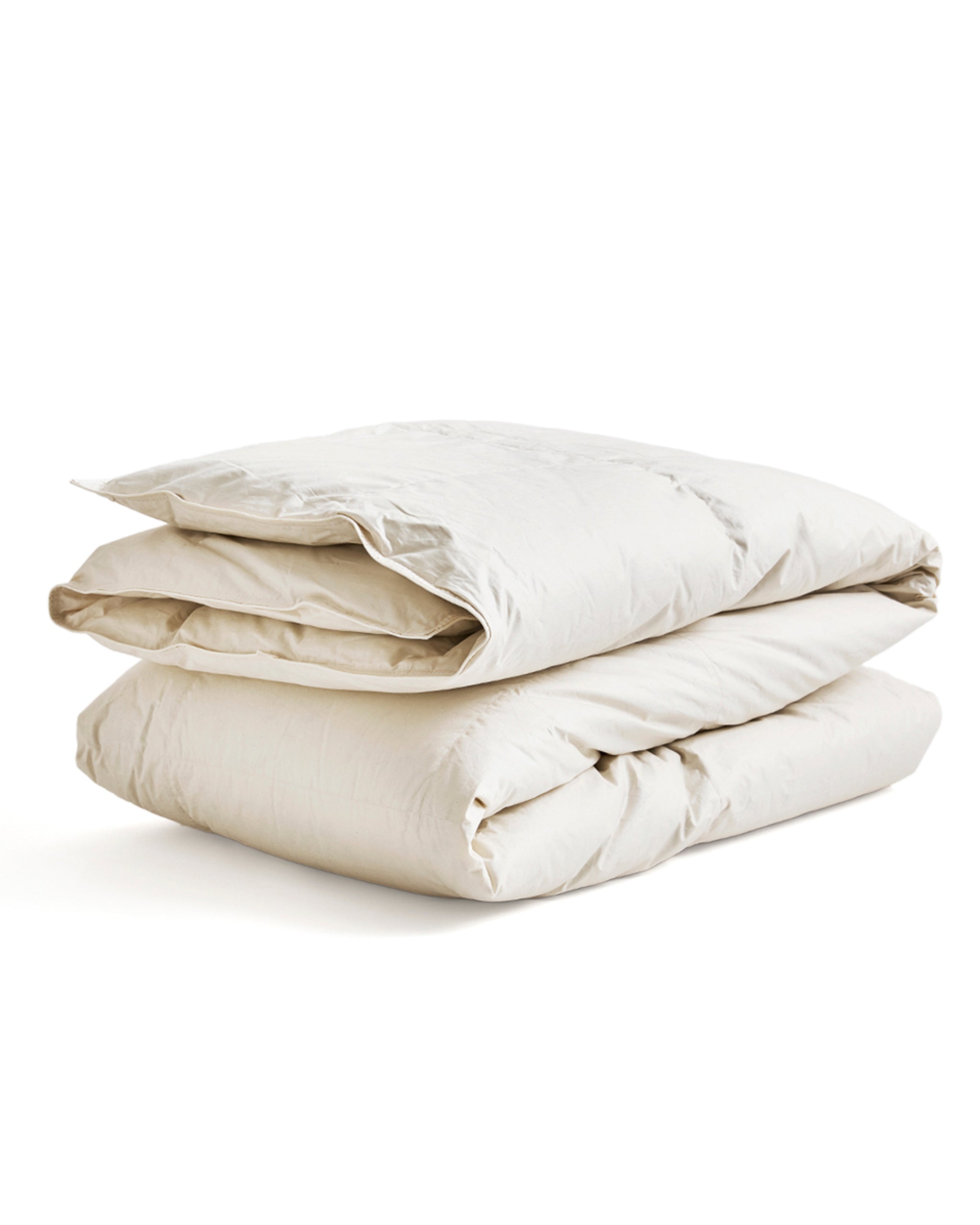 Folded duvet by iwata on a white background