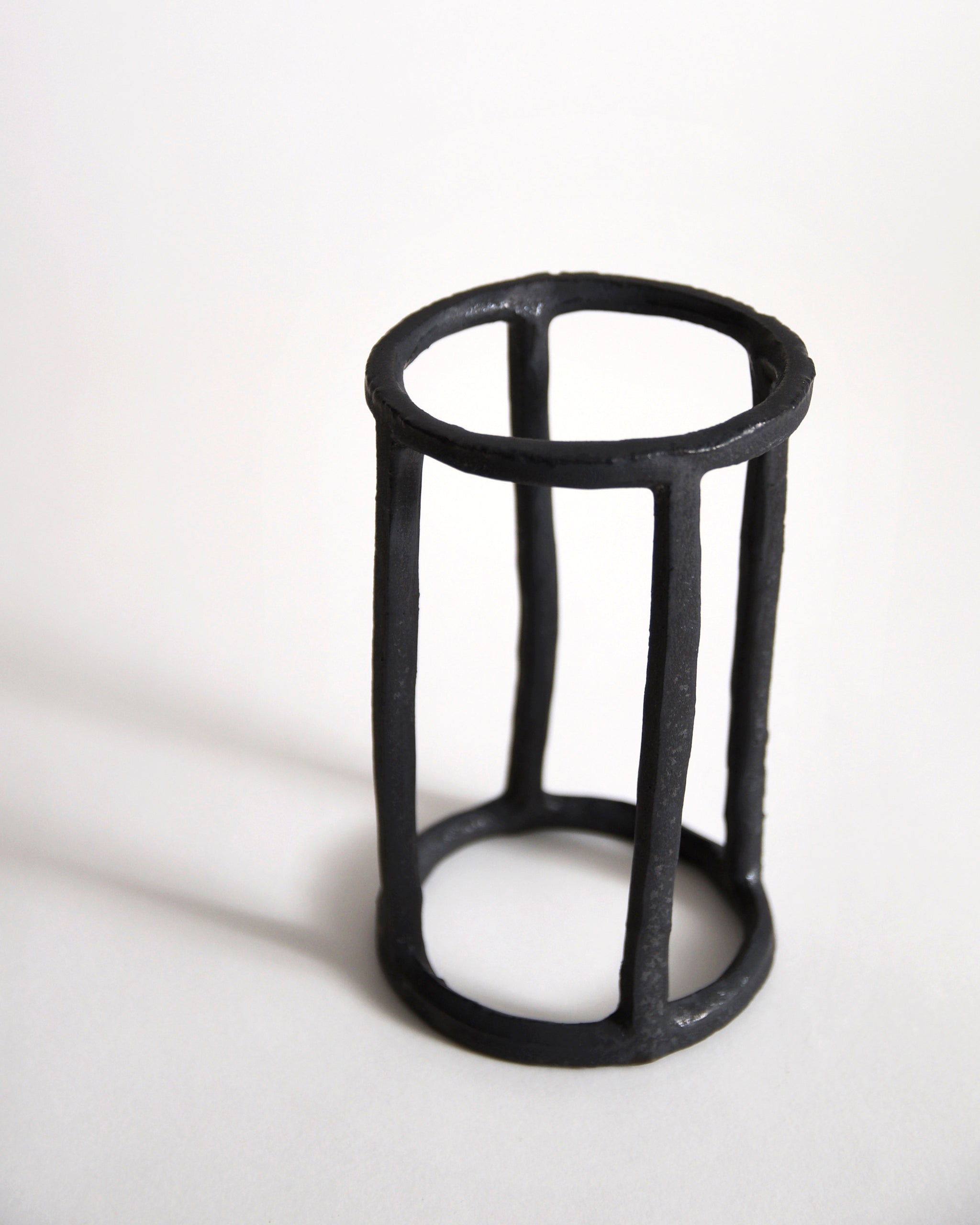 Cylindrical Box of Air by Masanobu Ando on a gray background