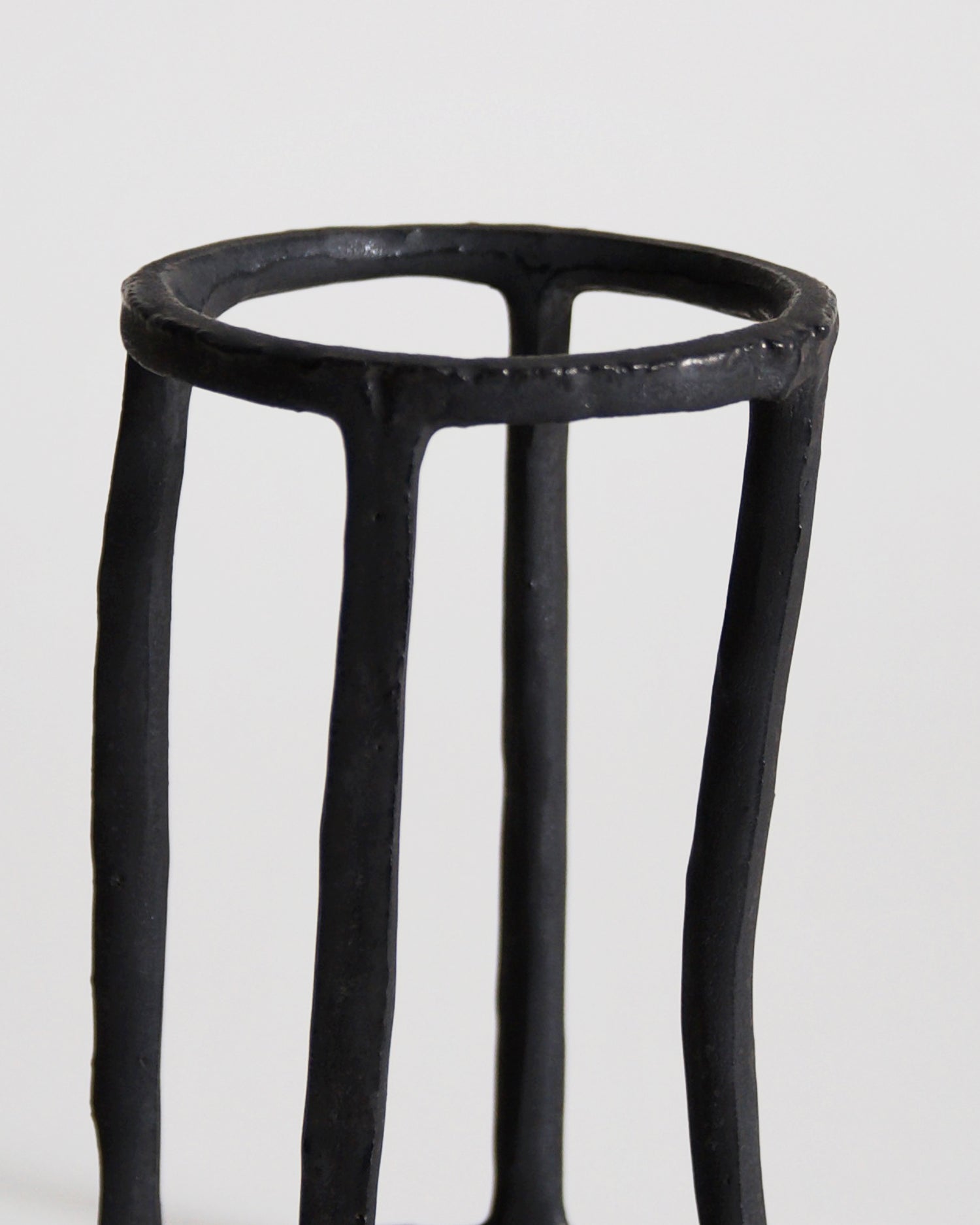 Close up of Cylindrical Box of Air by Masanobu Ando on a gray background