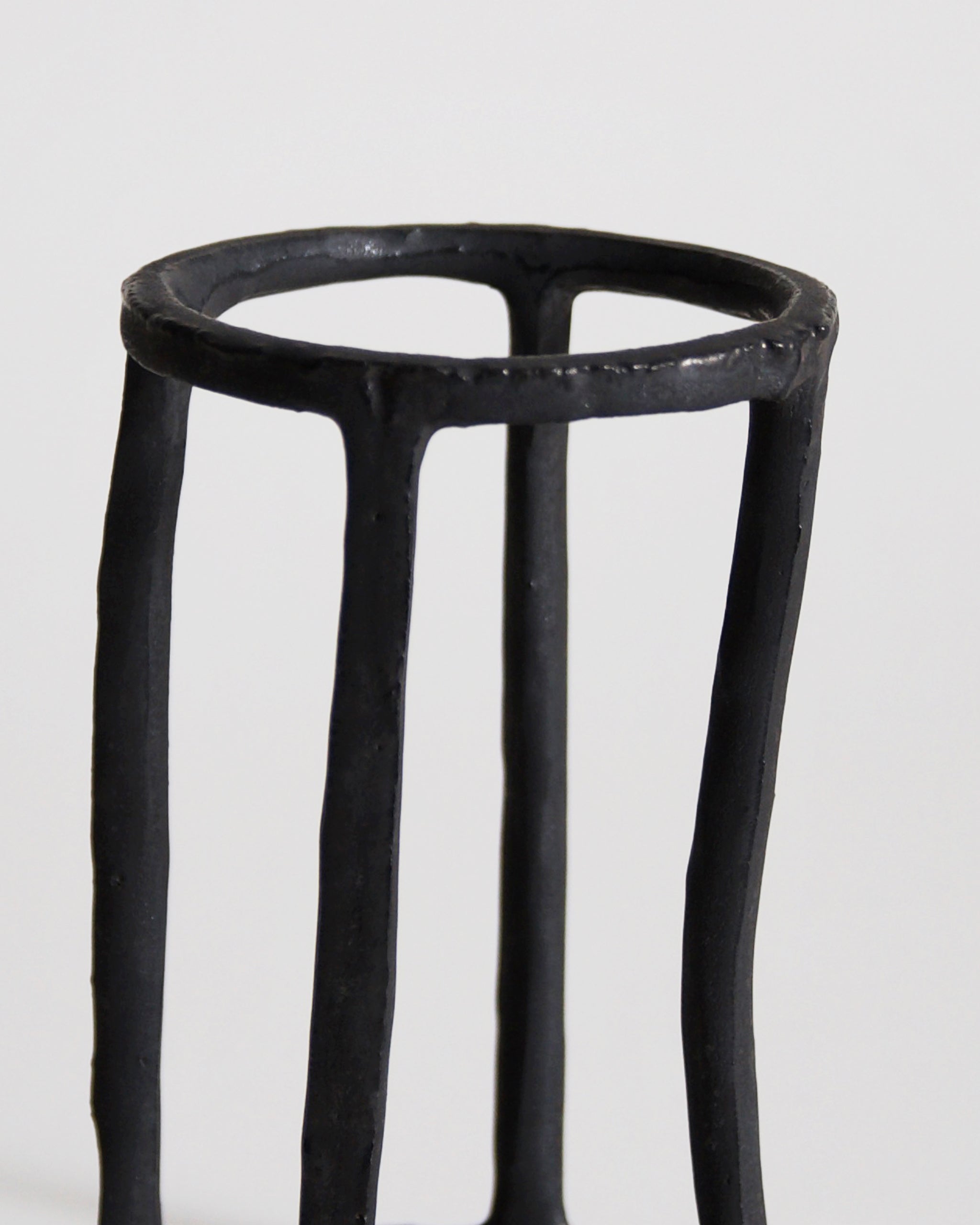 Close up of Cylindrical Box of Air by Masanobu Ando on a gray background