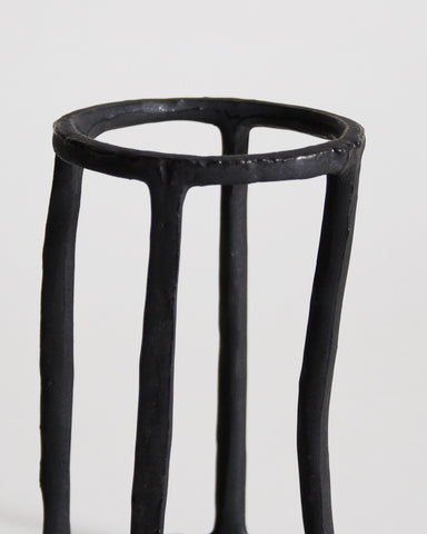 Close up of Cylindrical Box of Air by Masanobu Ando on a gray background