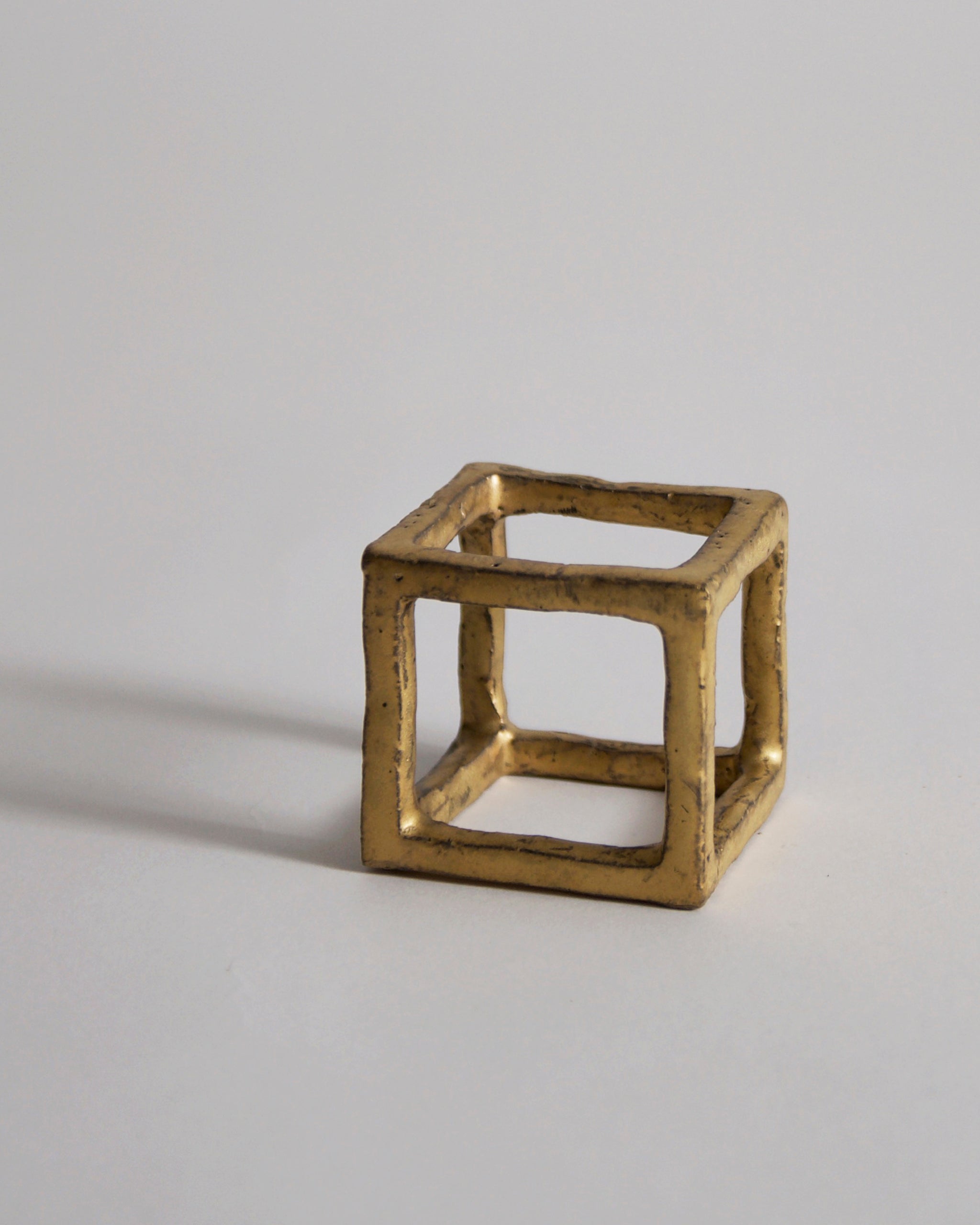 Gold Box of Air by Masanobu Ando on a gray background