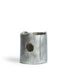 Silhouetted image of ceramic teapot warmer with sterling silver overglaze by Masanobu Ando against white background.
