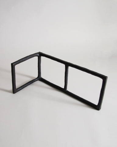 Black Rust Glaze Boundary Sculpture by Masanobu Ando on a gray background