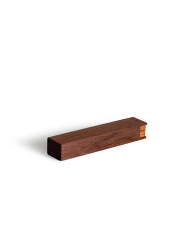 Walnut wood toothpick case by Nalata Nalata and Tanno on a white background