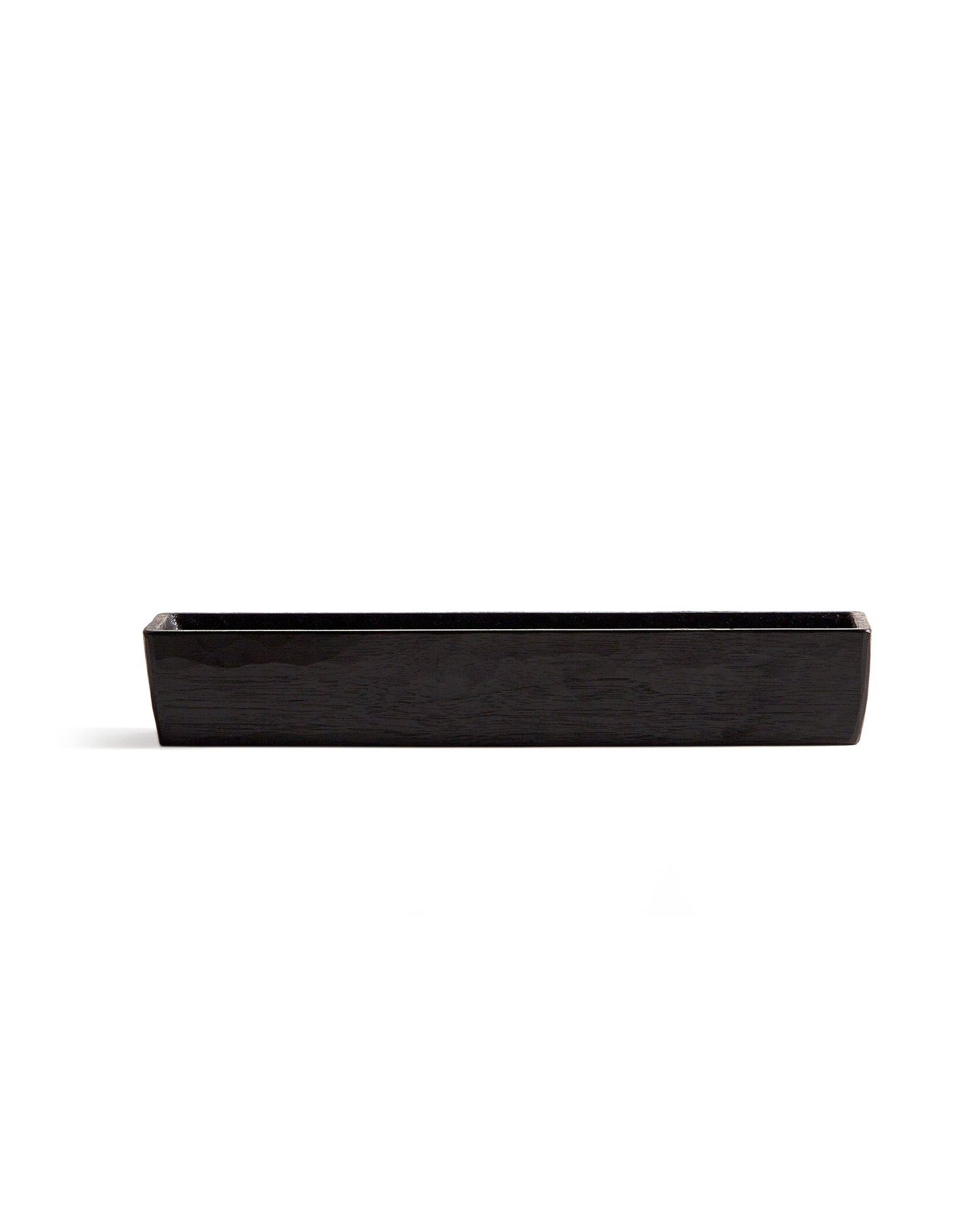 Silhouetted image of Chopsticks Holder by Ryuji Mitani against white background. 