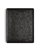 Silhouetted image of Carved Noir Wood Tray with Enju Wood by Ryuji Mitani against white background.
