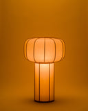 Kiko no hana Lamp in Small by Time and Style with light on on a white background