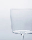 Cropped detail image of the time and style raisin glass focused on the top cup portion.