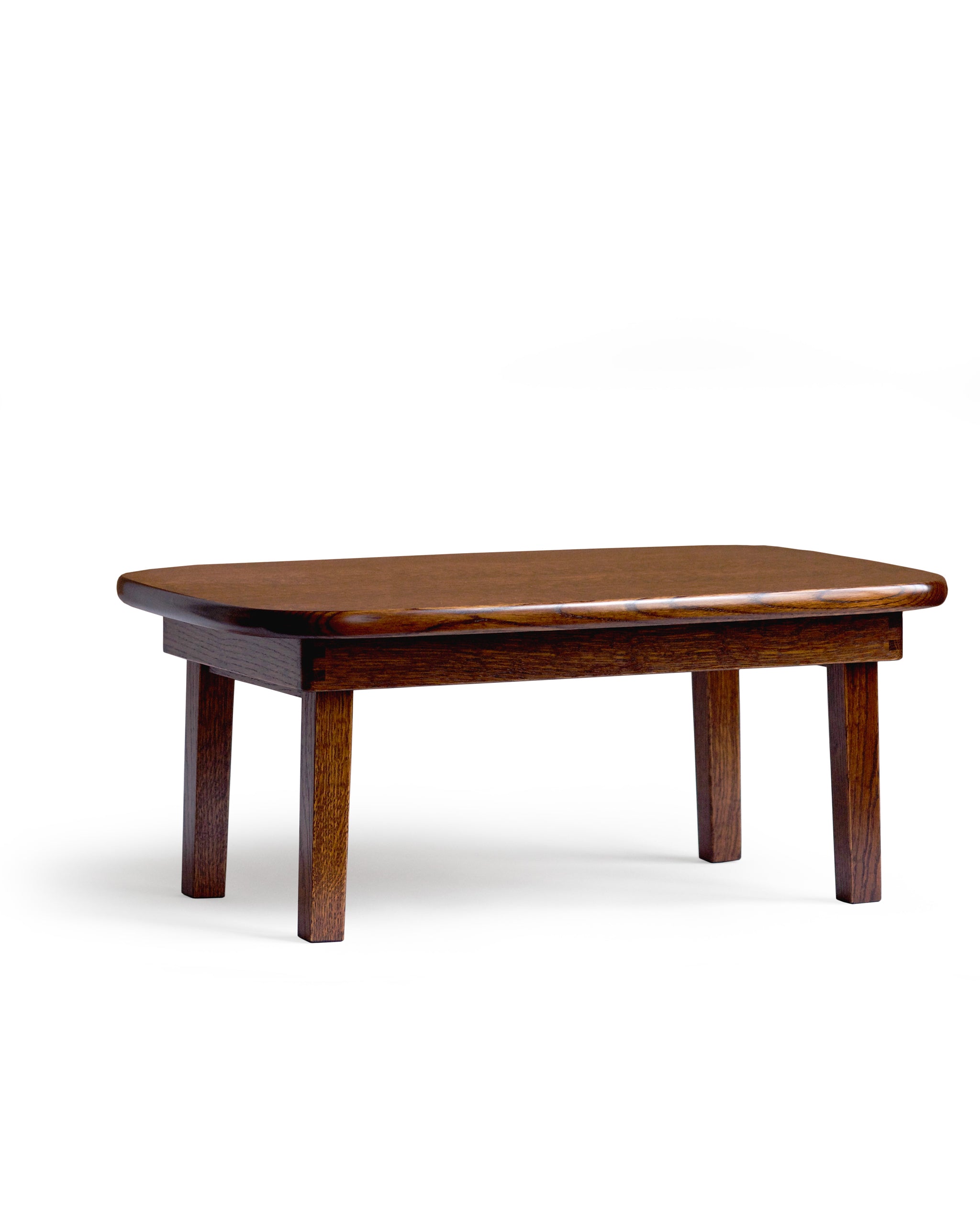 3/4 angled view of silhouetted chabudai table against white background.