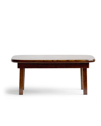 Straight front view of silhouetted chabudai table against white background.