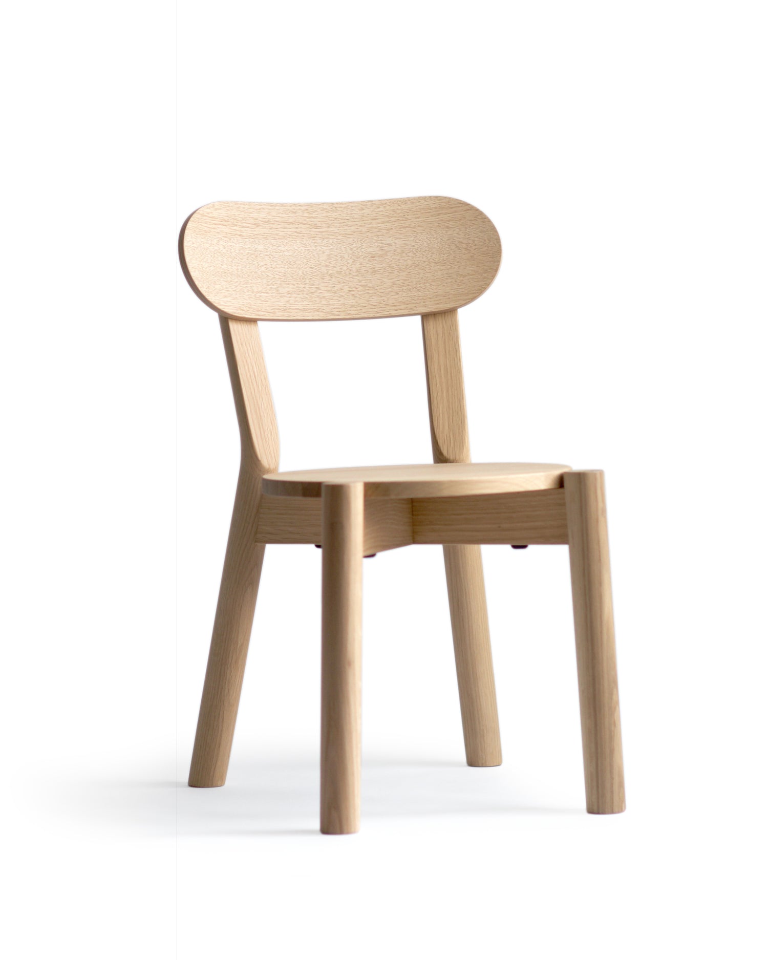 Silhouetted castor kids chair against white background at an angle.