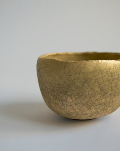 Cropped detail image of the exterior of the Gold Chawan XII.