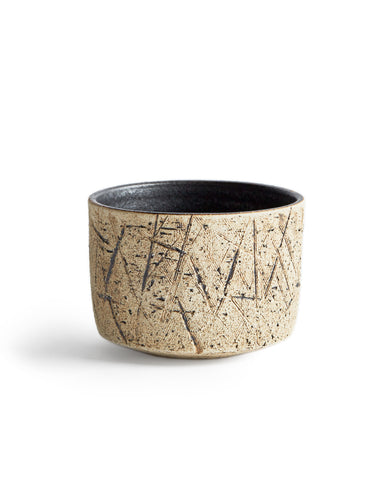 Silhouetted image of the kuro black matcha bowl against white background.