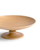 Detailed silhouetted image of the footed plate against white background.
